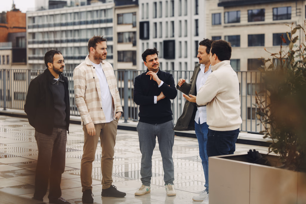 The team talking on the roof